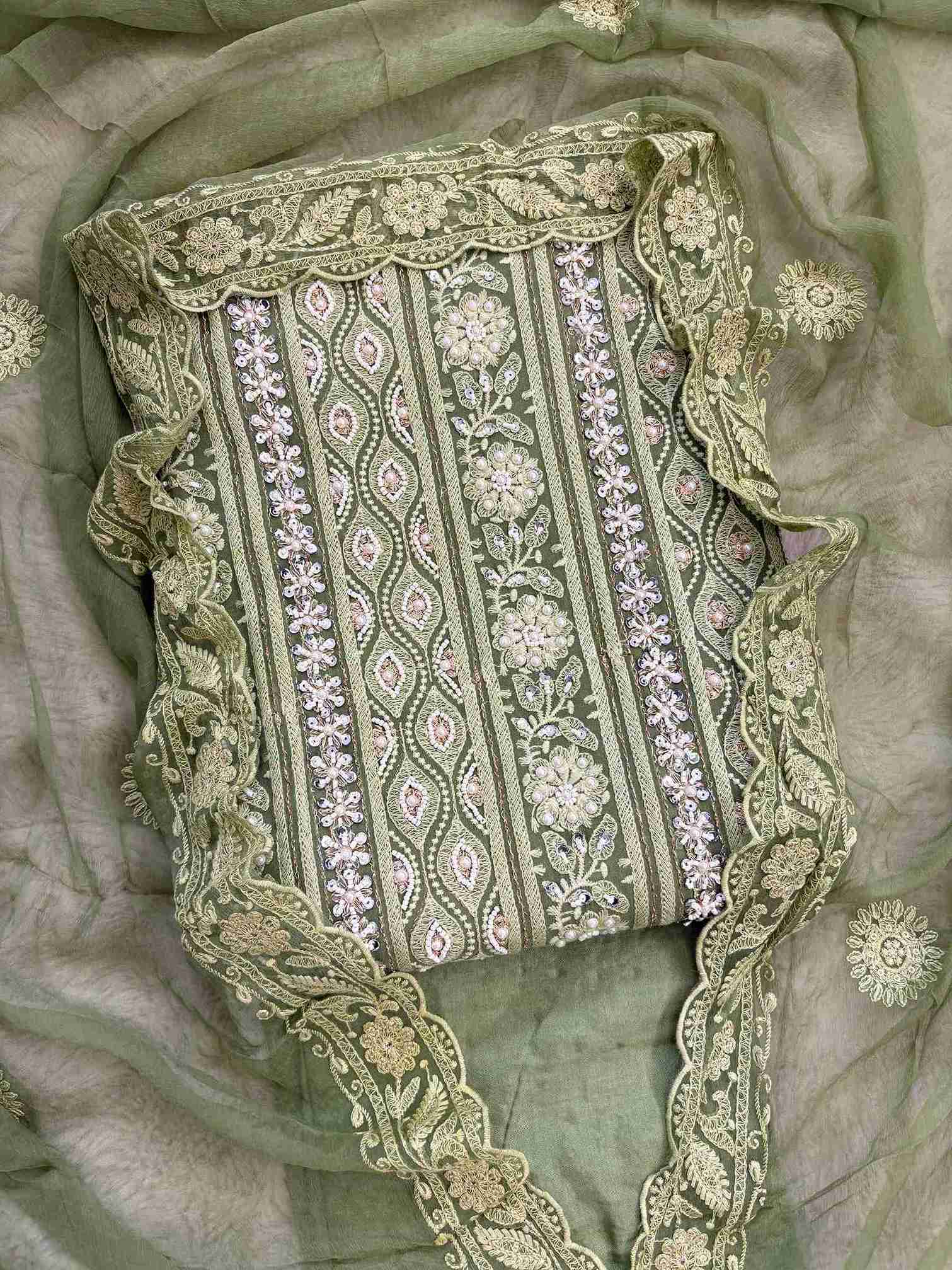 Mint green heavy chikankari georgette unstitched suit set front view